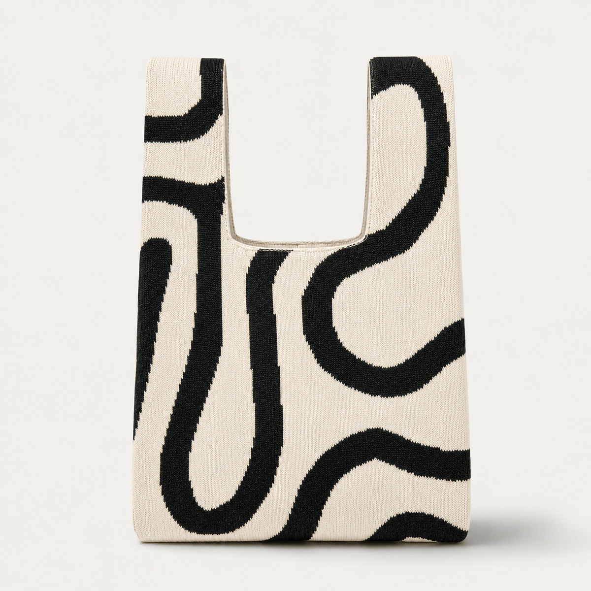 Tokeii -Abstract Flow Knitted Bag: Black/Cream
